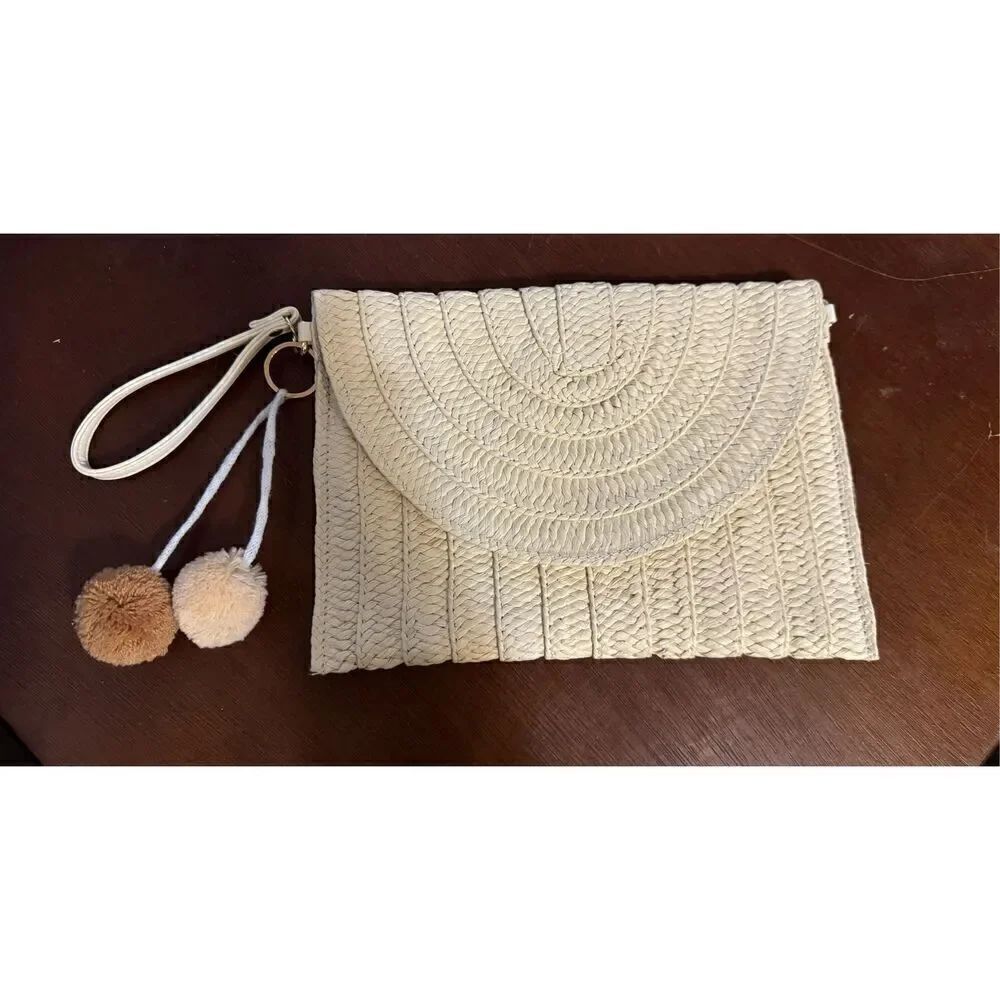 NWOT Weaved wrislet with pom pom key chain